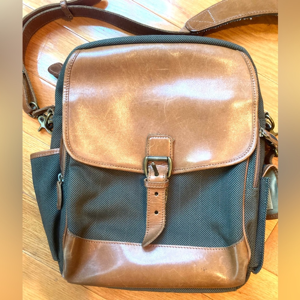 L.L. Bean sturdy, green twill fabric multipurpose bag with tan leather trim.